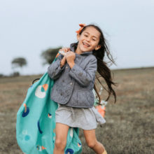 Outdoor Play - girl walking smile